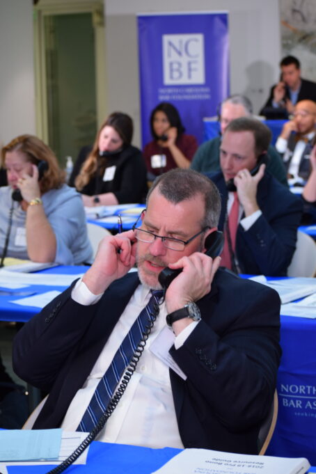Jon Heyl takes a call at 4ALL Statewide Service Day in 2020.