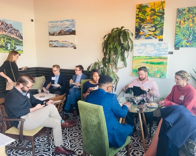 Young lawyers enjoy in-person networking event at The Bohemian wine bar in Charlotte.