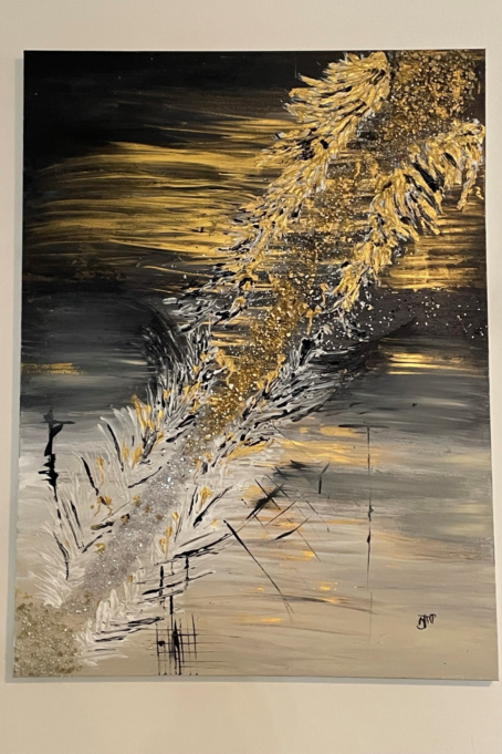 This is a photo of one of Nicky's paintings. Gold brushstrokes are across the top of the painting and also a strokes go diagonal from the top right.